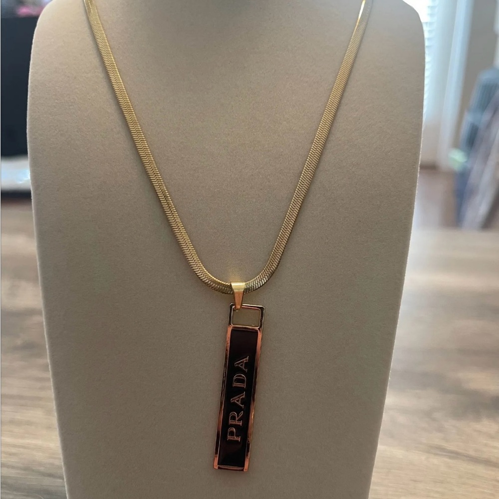 Prada Gold Chain with Black Bar Pendant